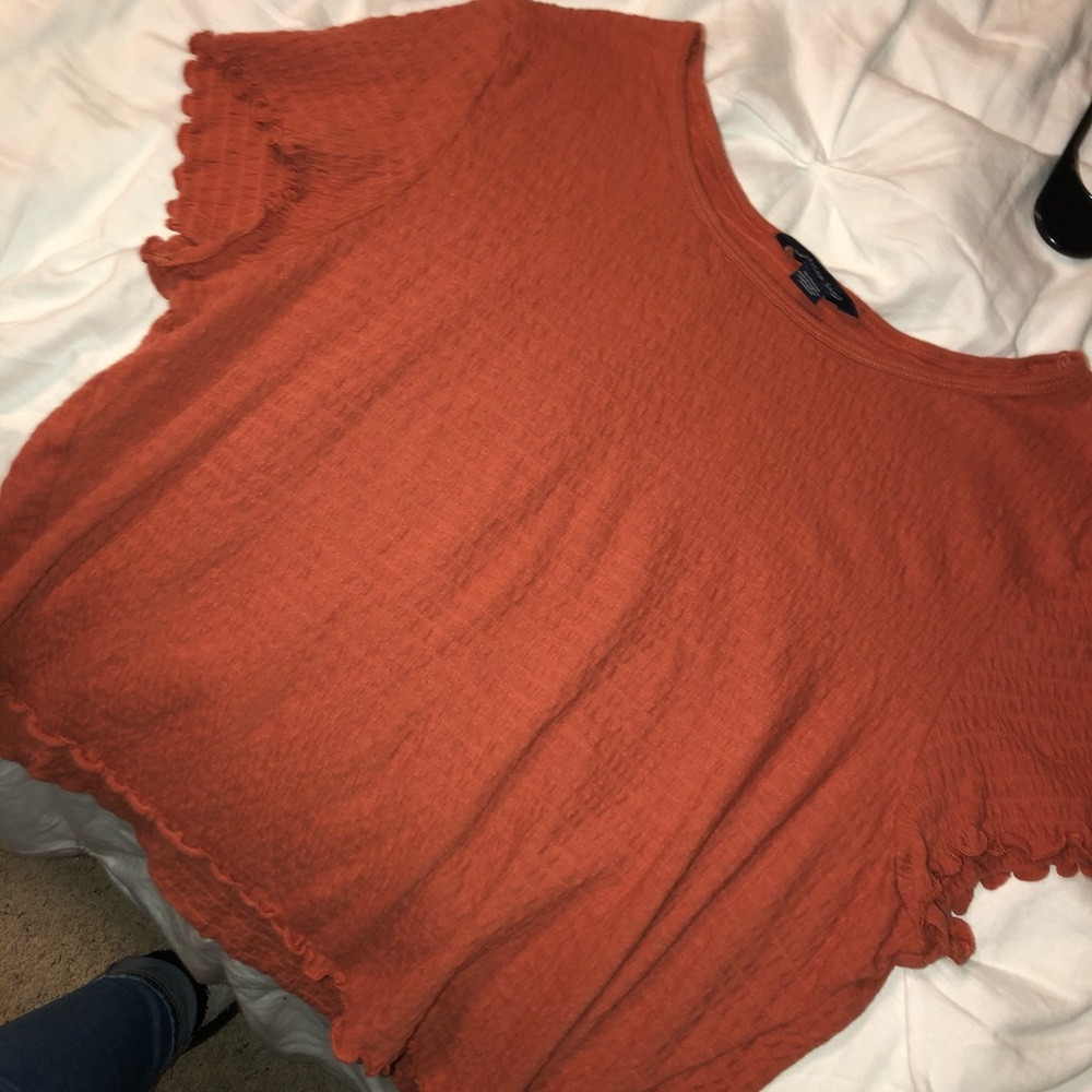 Solid maroon American eagle top